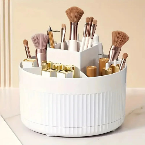 White ribbed rotating makeup organizer filled with brushes and cosmetics