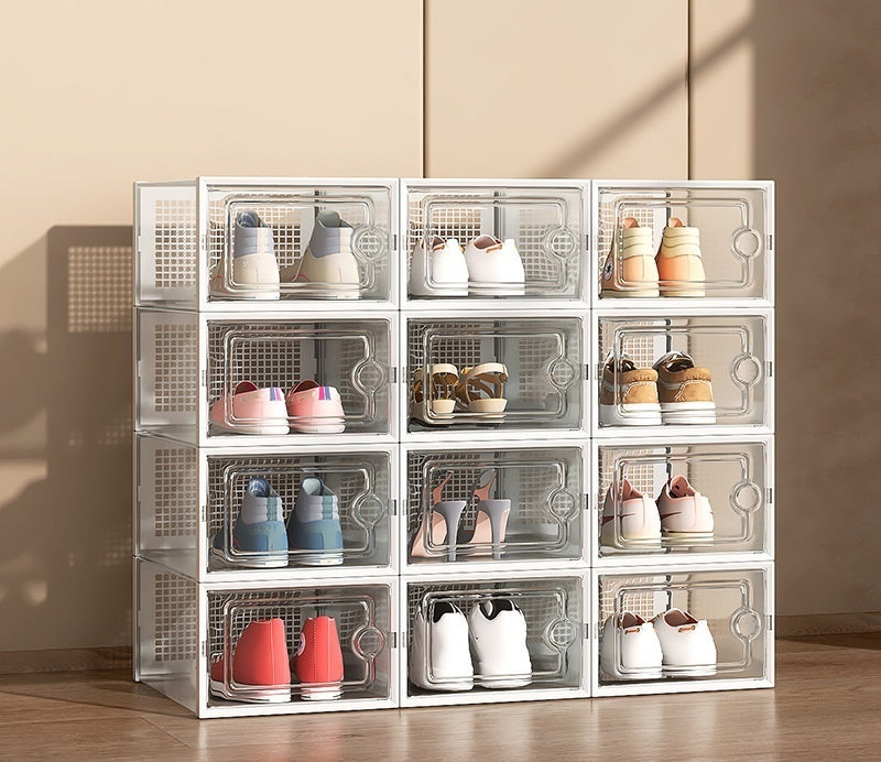 Stack of 12 clear shoe boxes with front-opening doors, each holding a pair of sneakers